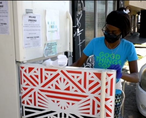 Person in front of designed fridge