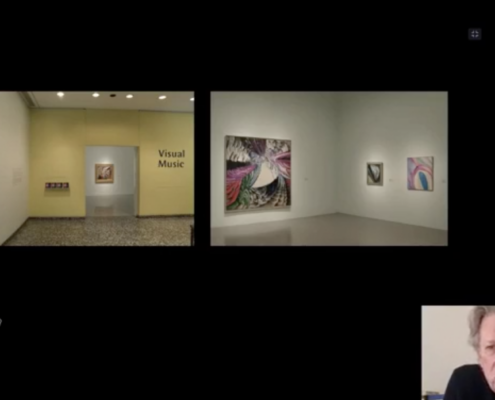 Splitscreen showing artwork with Kerry Brougher in a small rounded rectangle window
