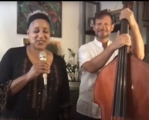 Renee Marie with bandmate who plays the cello