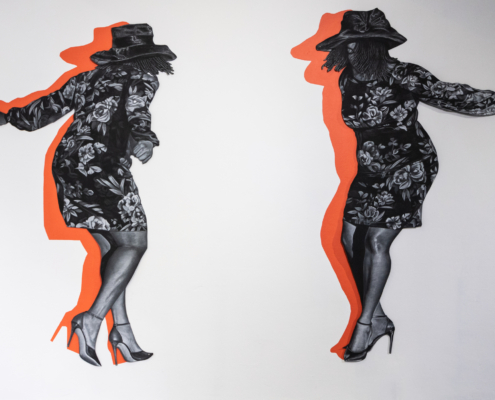 A charcoal drawing of two women wearing a floral dress, high heels and a hat are seen dancing. A red silhouette borders the figures.