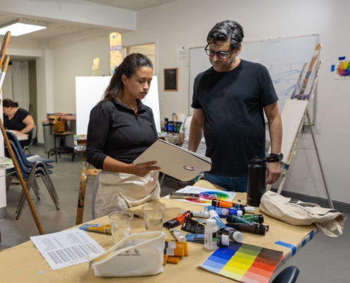 Painting class Raul and student in 100
